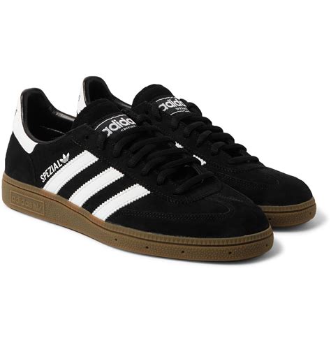 adidas black sneakers uk.